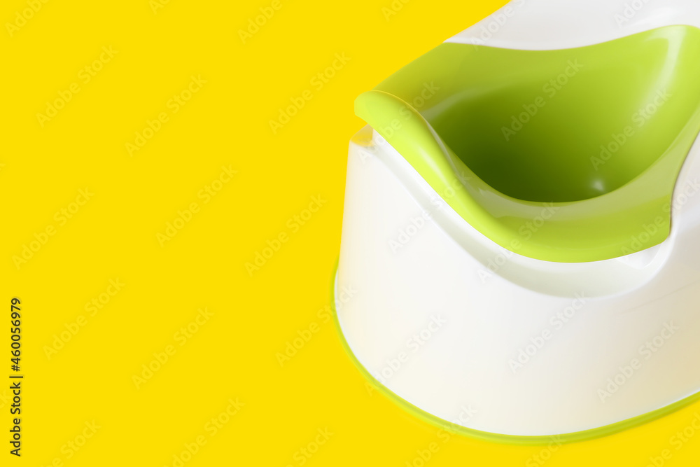 Potty on color background. Toilet training concept