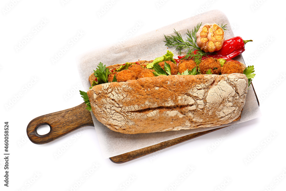 Board with bread and tasty cod cutlets on white background