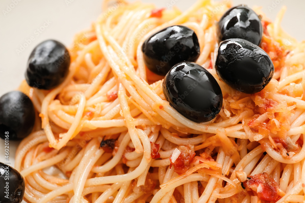 Delicious Pasta Alla Puttanesca on plate, closeup