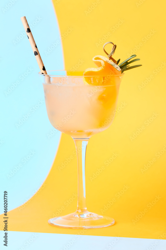 Glass of tasty melon cocktail on color background