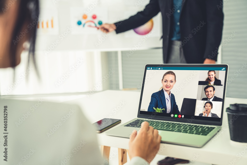 Business people in video call meeting proficiently discuss business plan in office and virual workpl