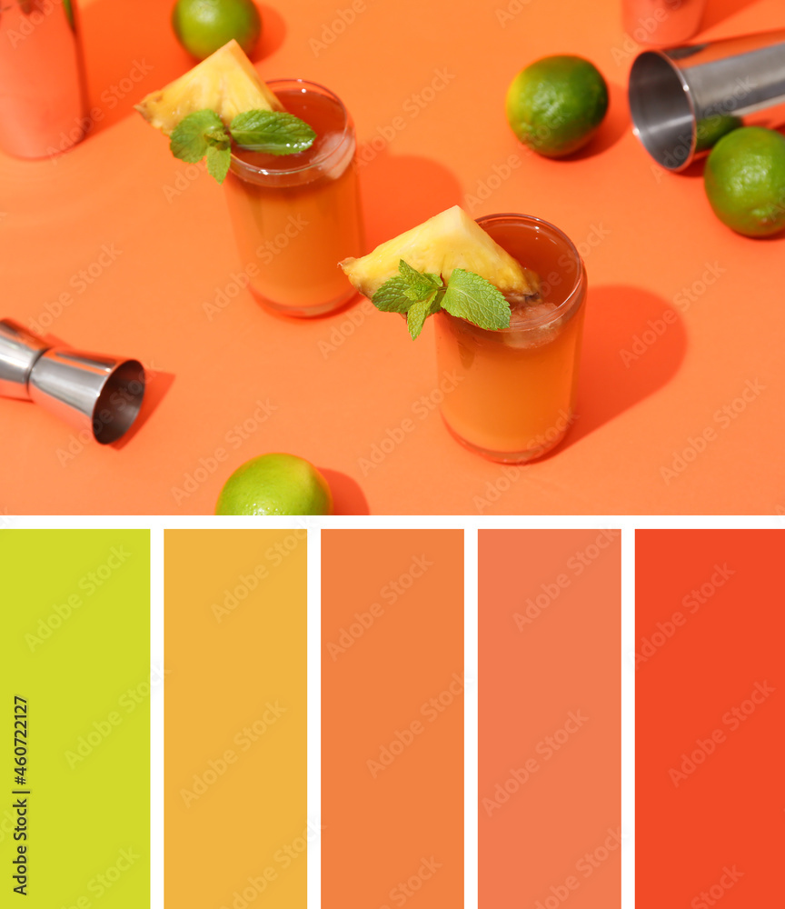 Glasses of tasty mai tai cocktail on orange background. Different color patterns