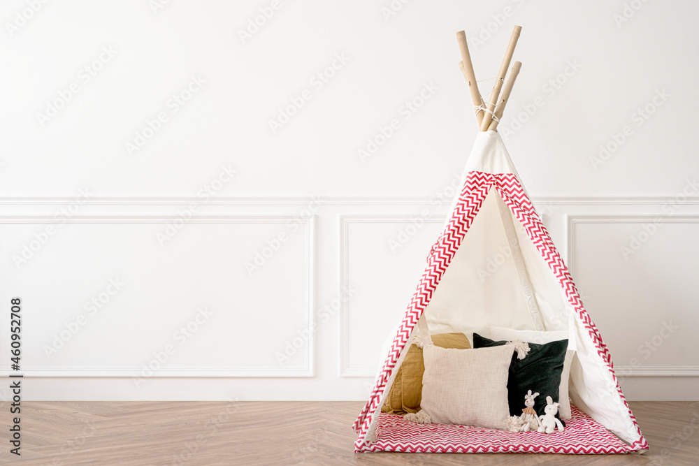 Cute teepee tent in a kids play room