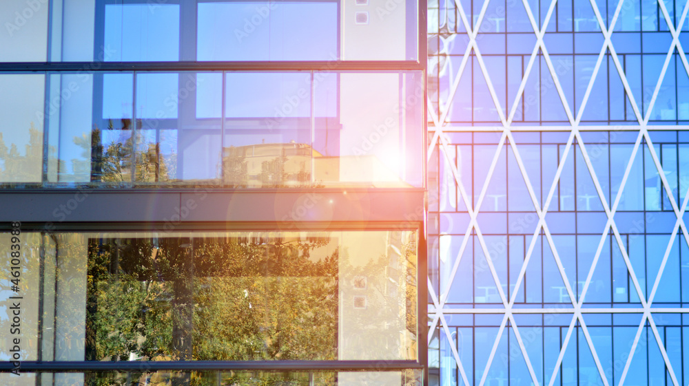 Modern apartment building. Modern urban architecture and details of building facade. Sunlight.