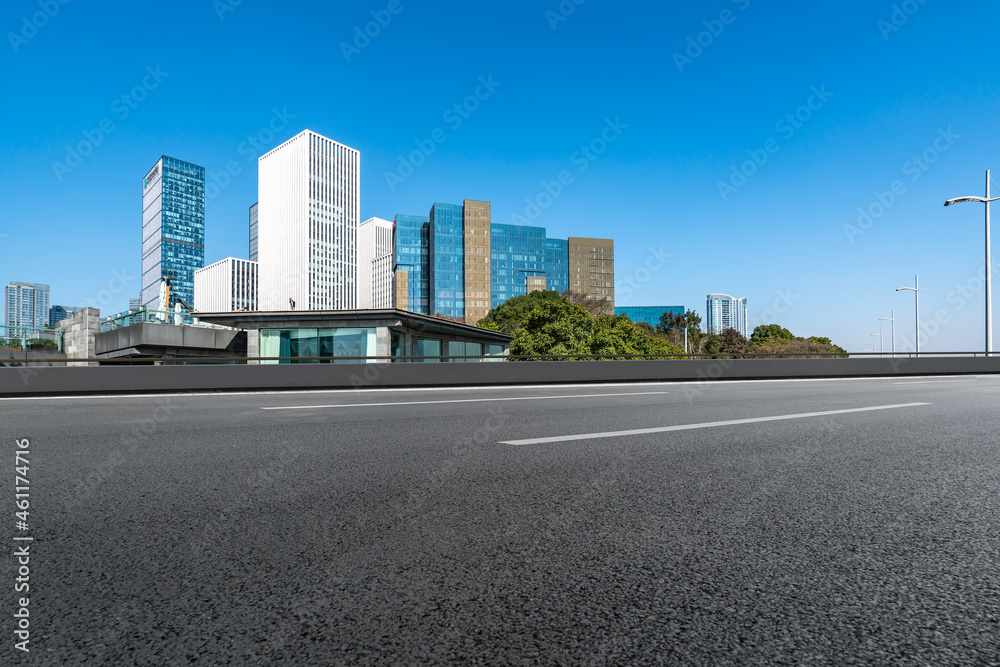 Empty asphalt road and city skyline and building landscape, China.