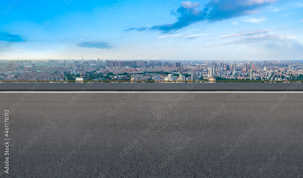 Empty asphalt road and city skyline and building landscape, China.