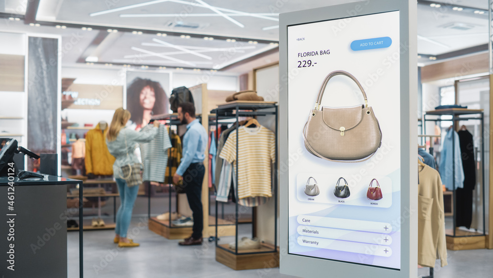 Shot of a Floor-Standing LCD Touch Screen Display with User Interface of Online Clothing Shop Standi