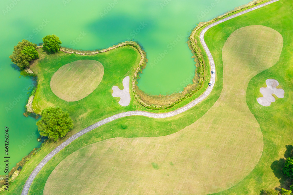 Aerial view of beautiful green golf course.