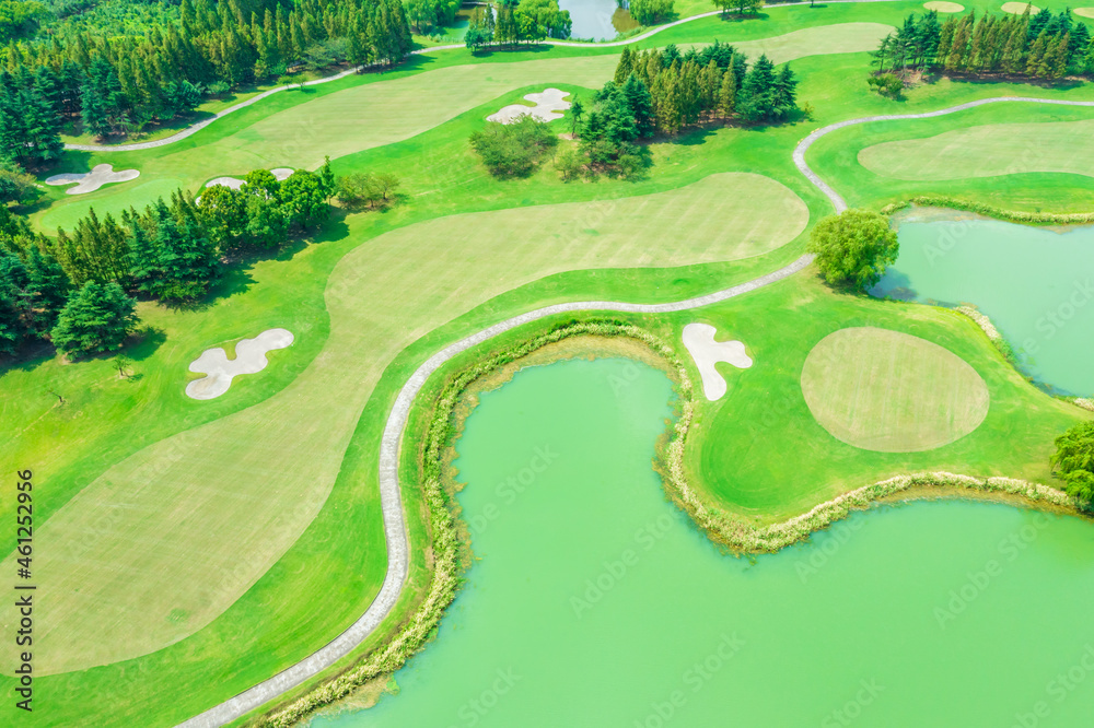 Aerial view of beautiful green golf course.