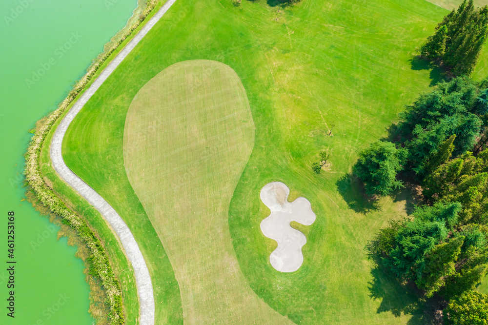 Aerial view of beautiful green golf course.