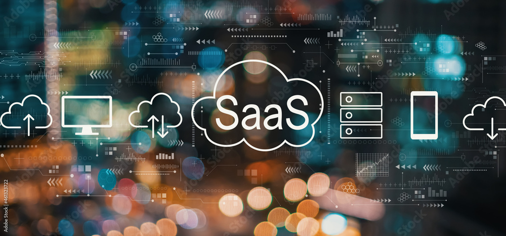 SaaS - software as a service concept with blurred city abstract lights background