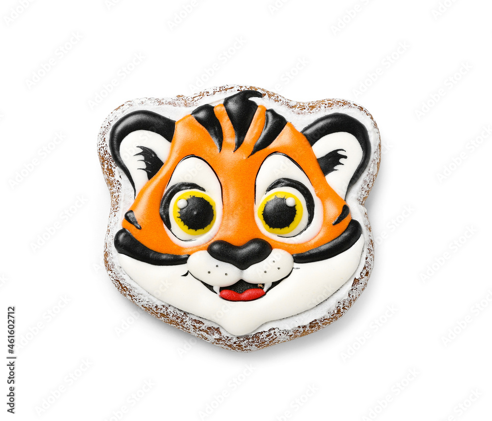 Cute cookie in shape of tiger for New Year 2022 on white background