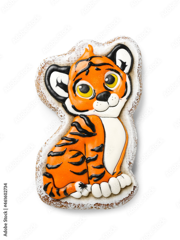 Cute cookie in shape of tiger for New Year 2022 on white background