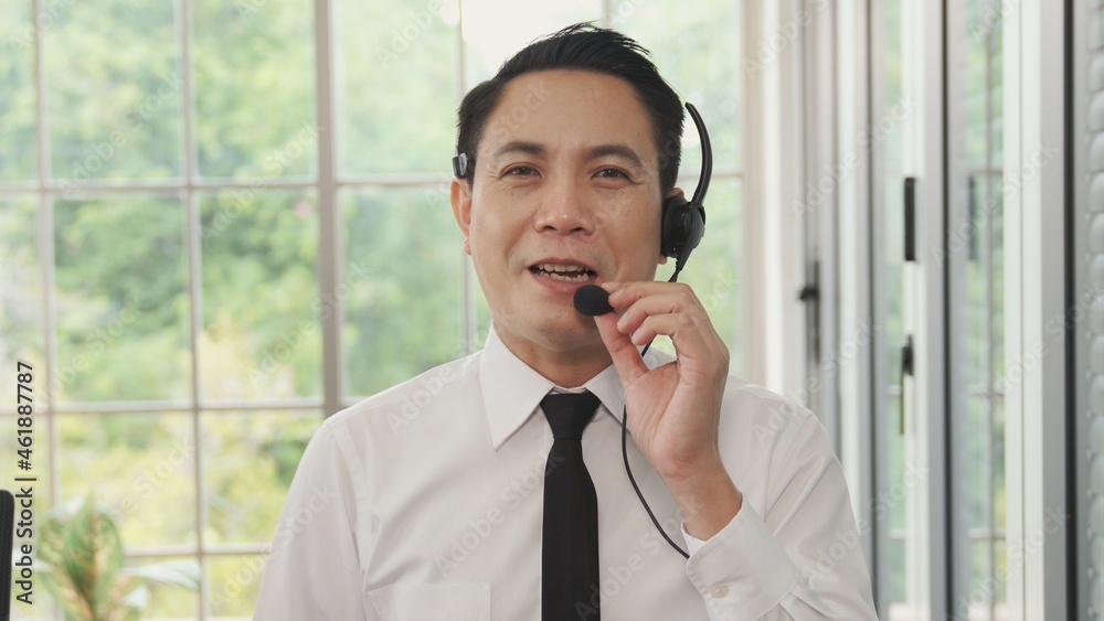 Video call camera view of businessman talks actively in videoconference . Call center, telemarketing