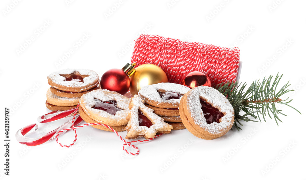 Tasty Linzer cookies with Christmas decor on white background