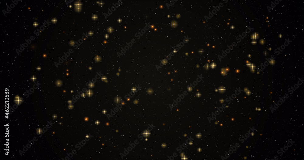 Image of warm glowing yellow stars and orange spots on black background