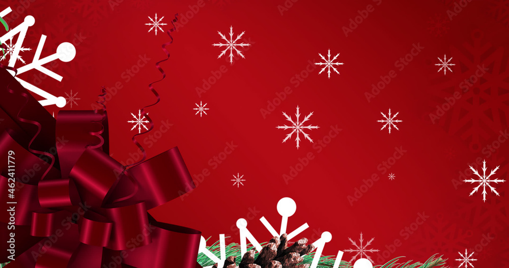 Image of snowflakes falling over red christmas bow