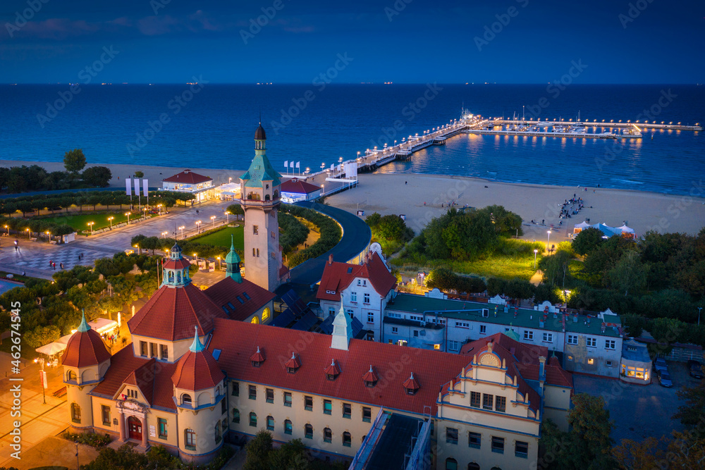 Beautiful architecture of Sopot city at the pier (Molo) by the Baltic Sea at dusk, Poland.