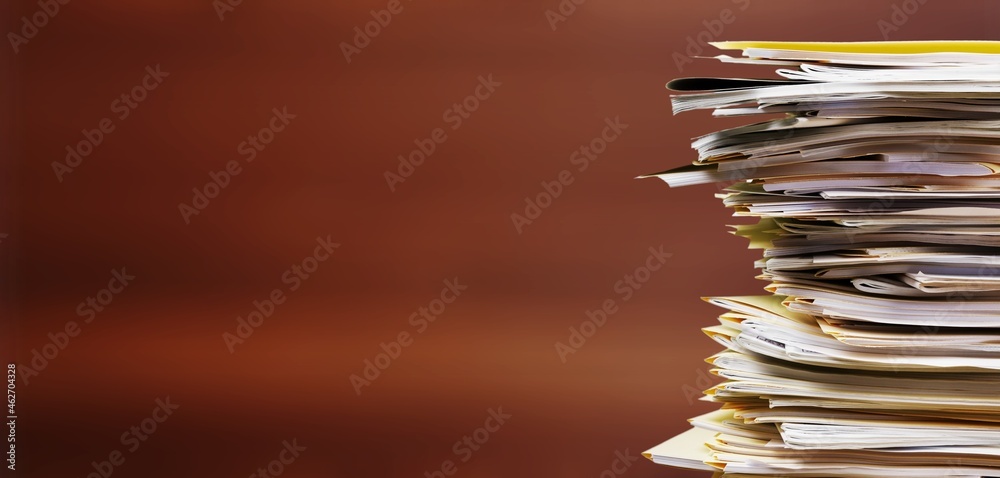 Old manuscripts lie in a stack, beautiful paper background,