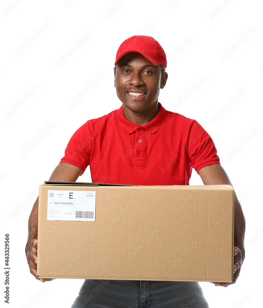 African-American delivery man with parcel on white background