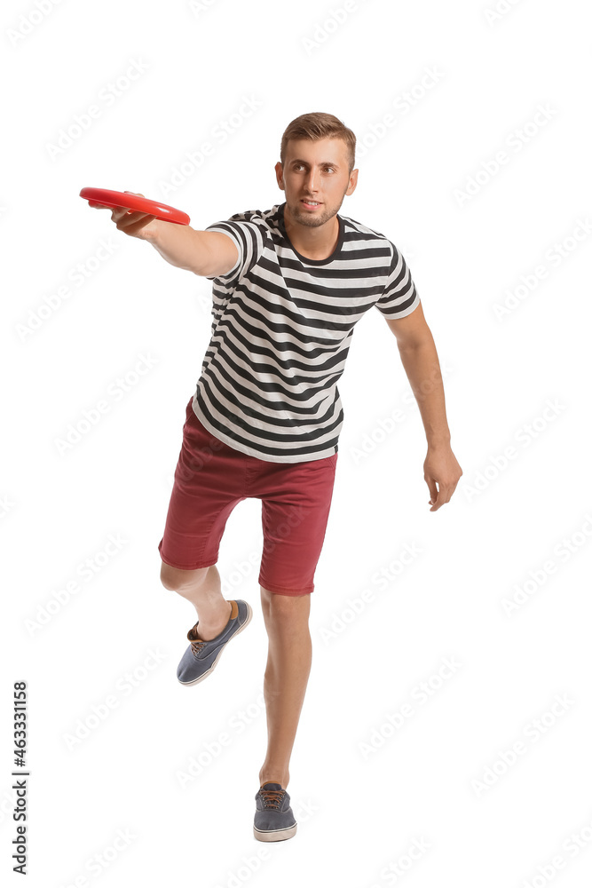 Young man throwing frisbee on white background