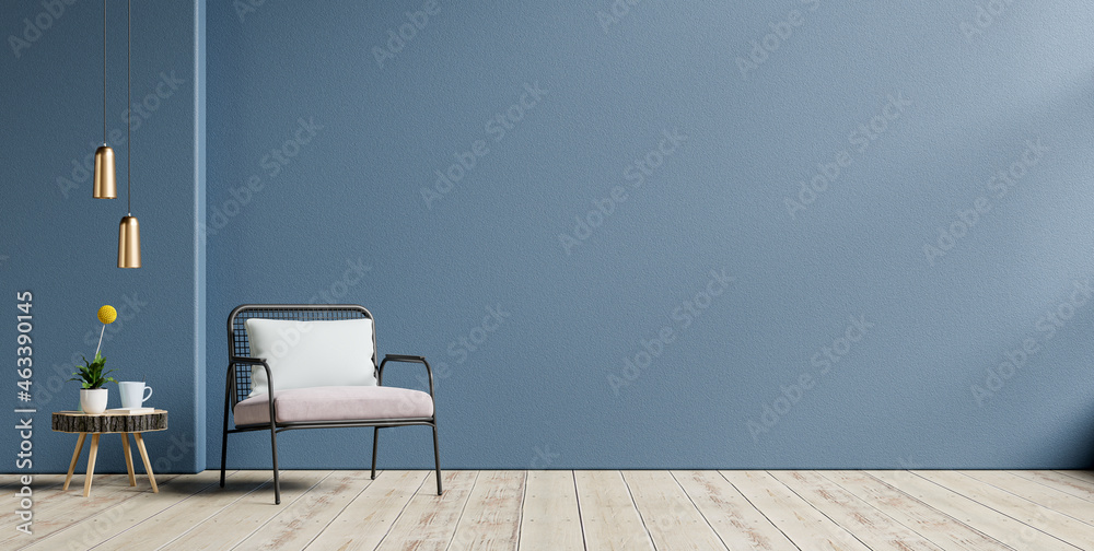 Living room with an armchair on empty dark blue wall background.