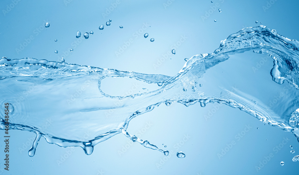 Water splash isolated on blue background