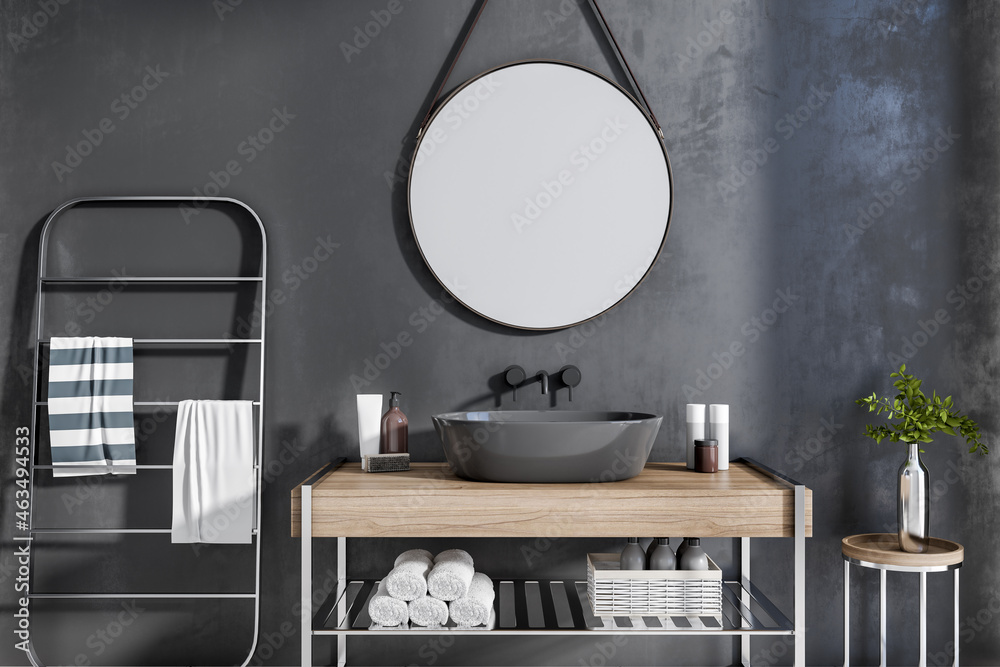 Contemporary bathroom interior with drying rack, mirror and wash basin. Design and interior concept.