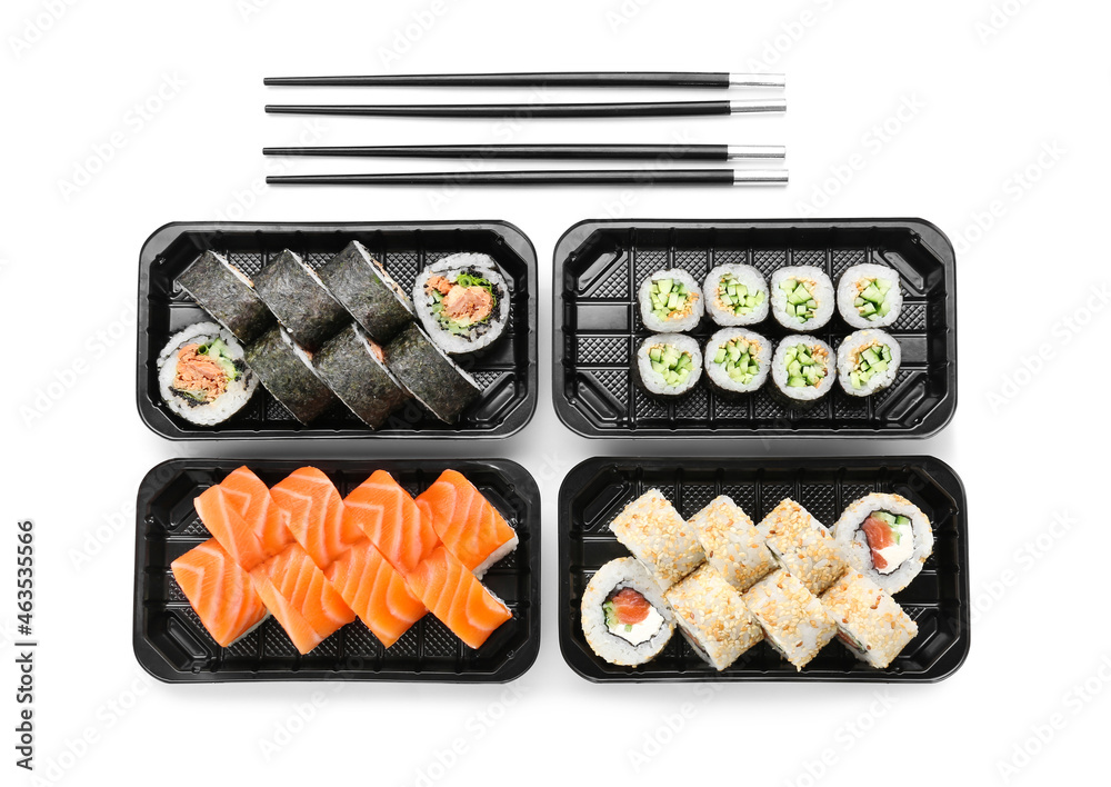 Composition with delicious sushi rolls on white background