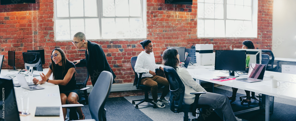 Businesspeople working in a creative modern office