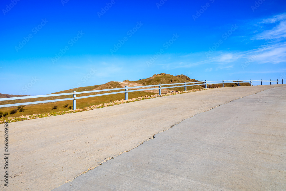 Empty road and mountain natural landscape in autumn season.Road and mountain background.