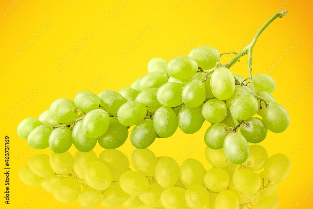 Set of beautiful bunch of fresh green grape on background