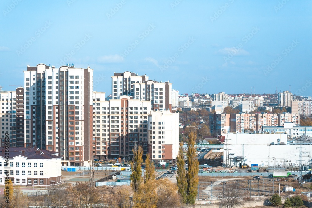 The architectural complex of residential buildings on sky background