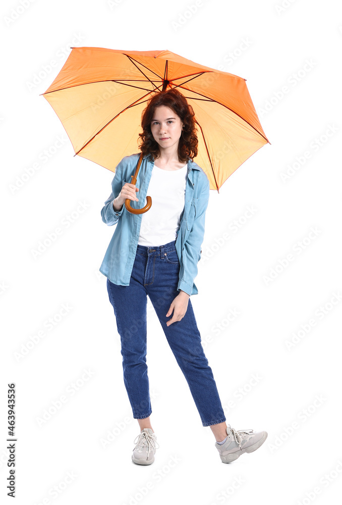 Pretty teenage girl with open orange umbrella on white background