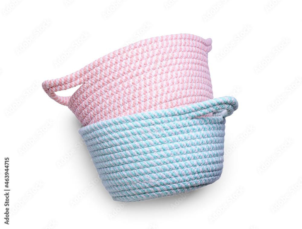 Stylish baskets on white background