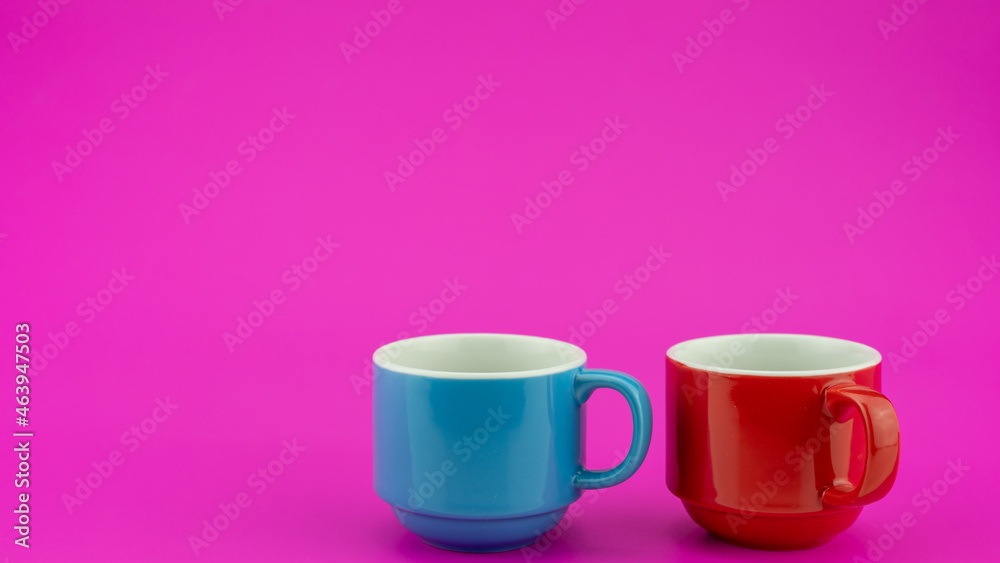 Colorful coffee cup on colorful paper background A lot of cups for coffee and tea in coffee shop Foo