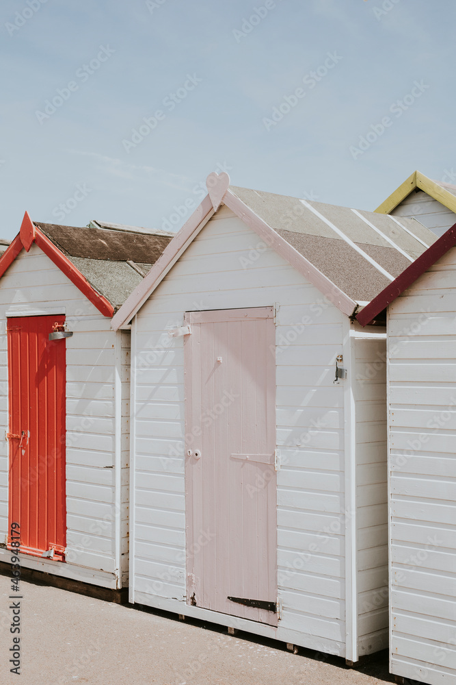 Pastel beach huts by the beach