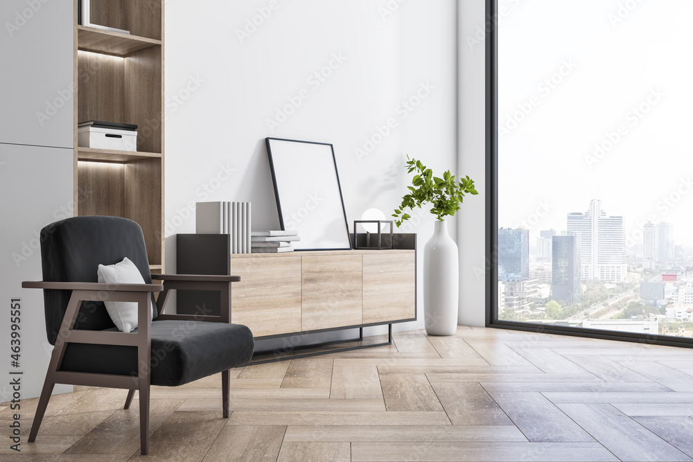 Luxury interior with wooden flooring, bookcase, armchair, decorative plant and window with city view