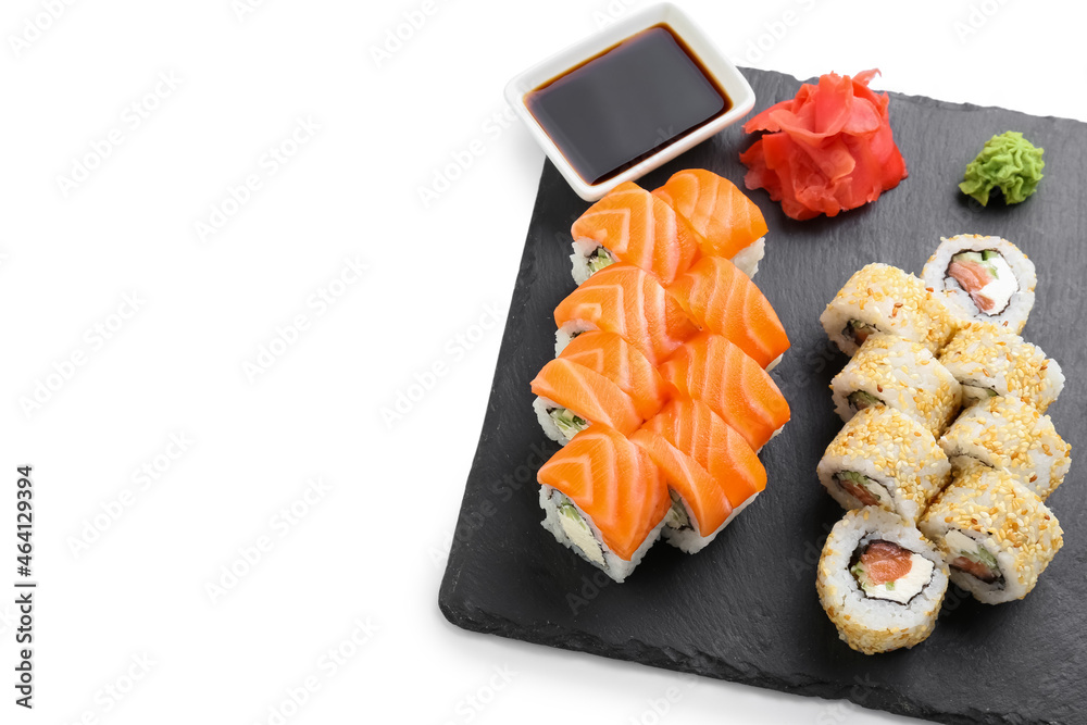 Delicious sushi rolls on white background