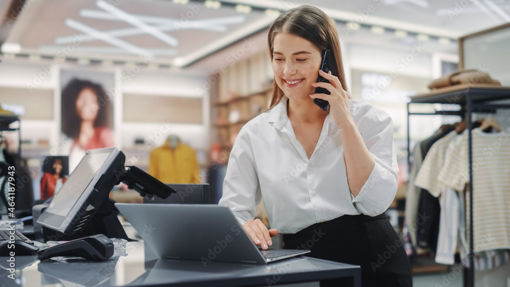 Modern Clothing Store: Friendly Customer Support Specialist Talks to Client on the Smartphone. Smili