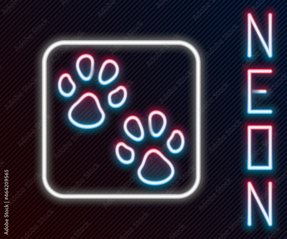 Glowing neon line Paw print icon isolated on black background. Dog or cat paw print. Animal track. C