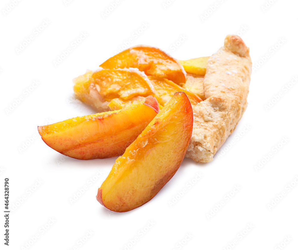 Piece of tasty peach galette on white background