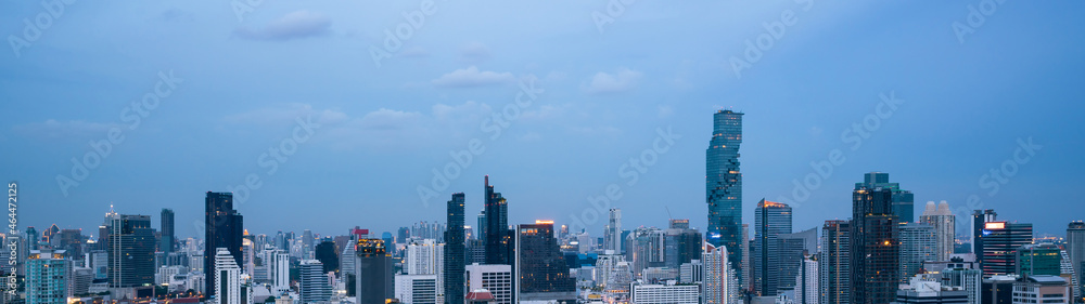 Night cityscape and high-rise buildings in metropolis city center . Downtown business district in pa