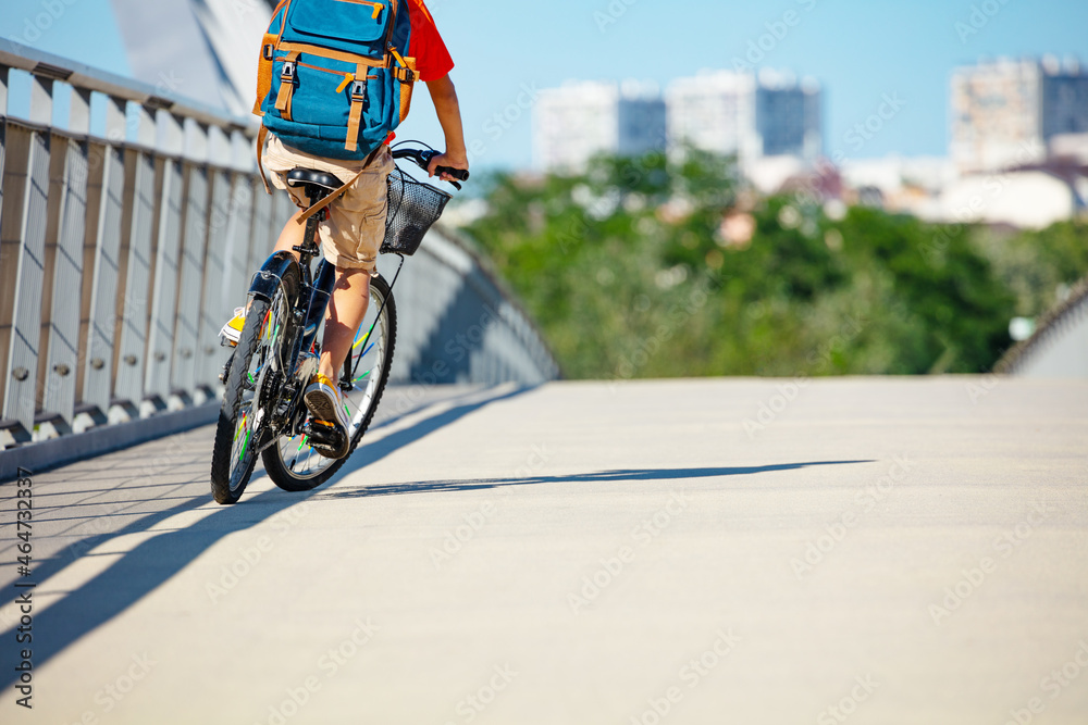 Close up of child bicycle wheels ride on bike lane