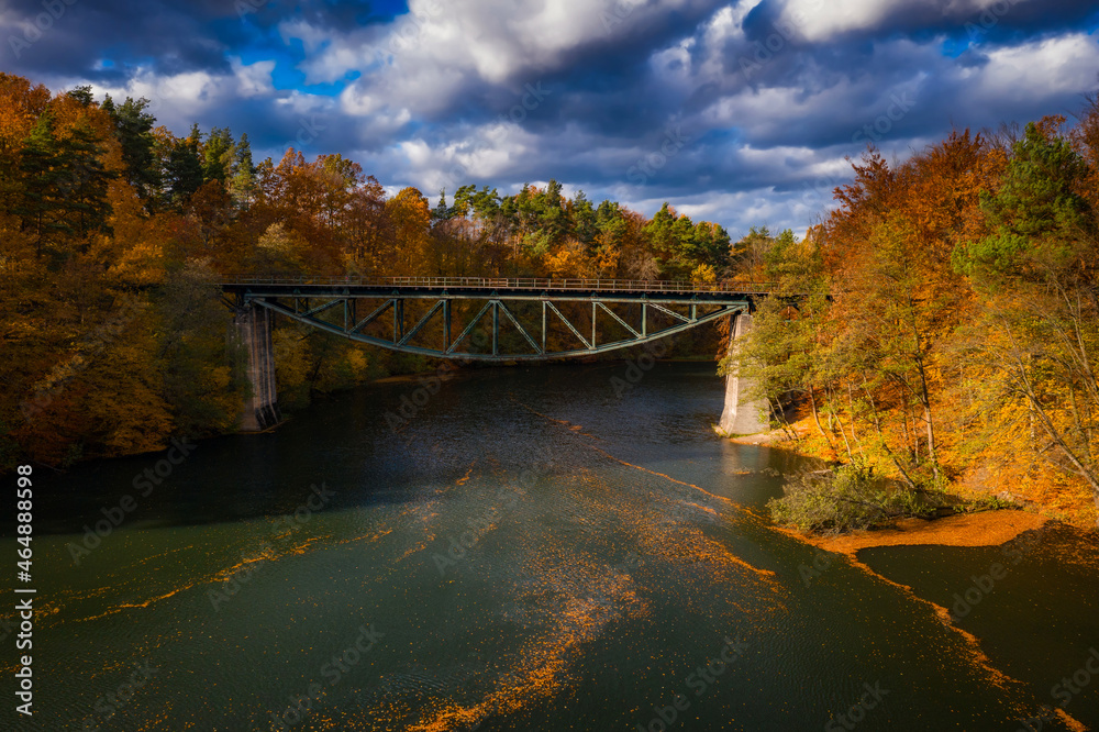 Autumnal scenery and the railway bridge in Rutki, Kashubia. Poland