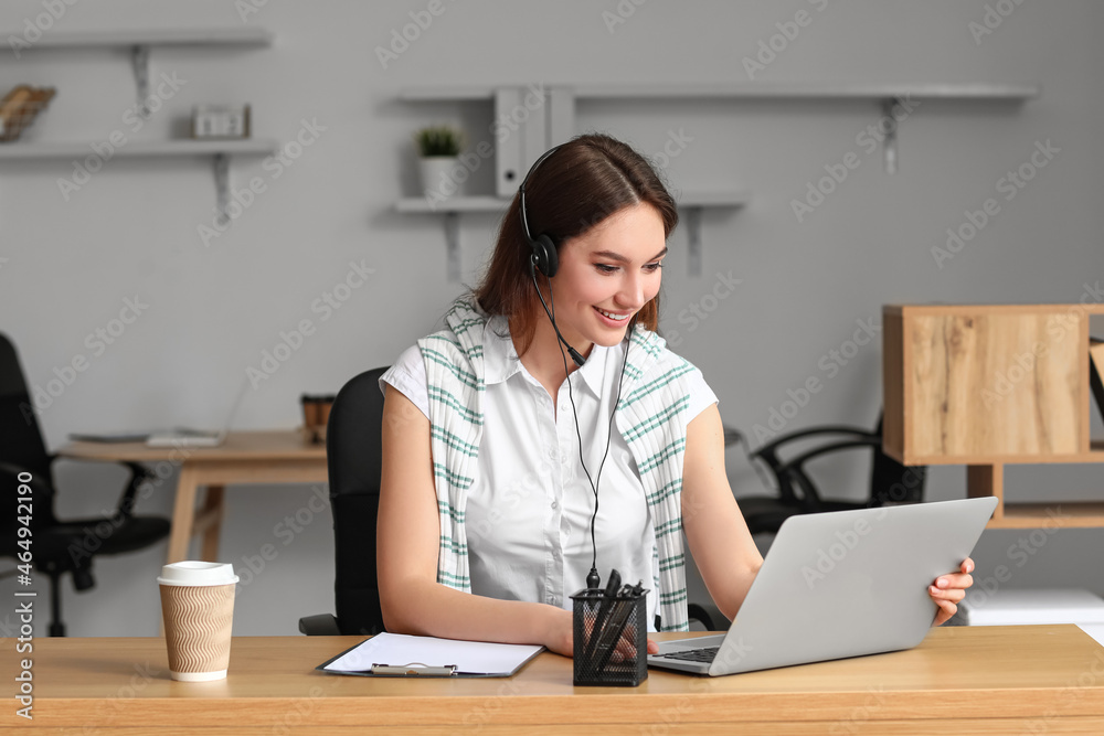 Technical support agent working in office