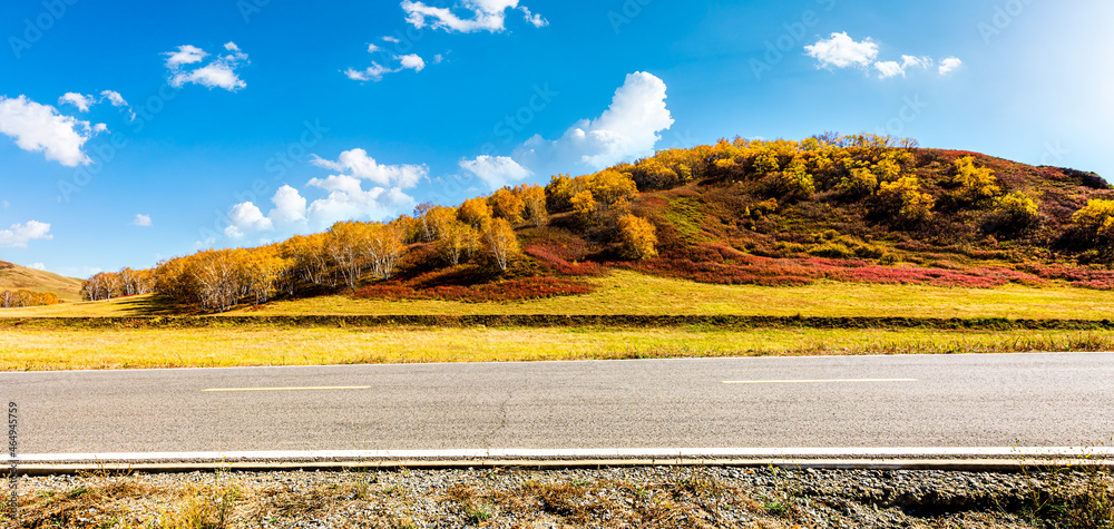 Asphalt road and mountain nature landscape at autumn.