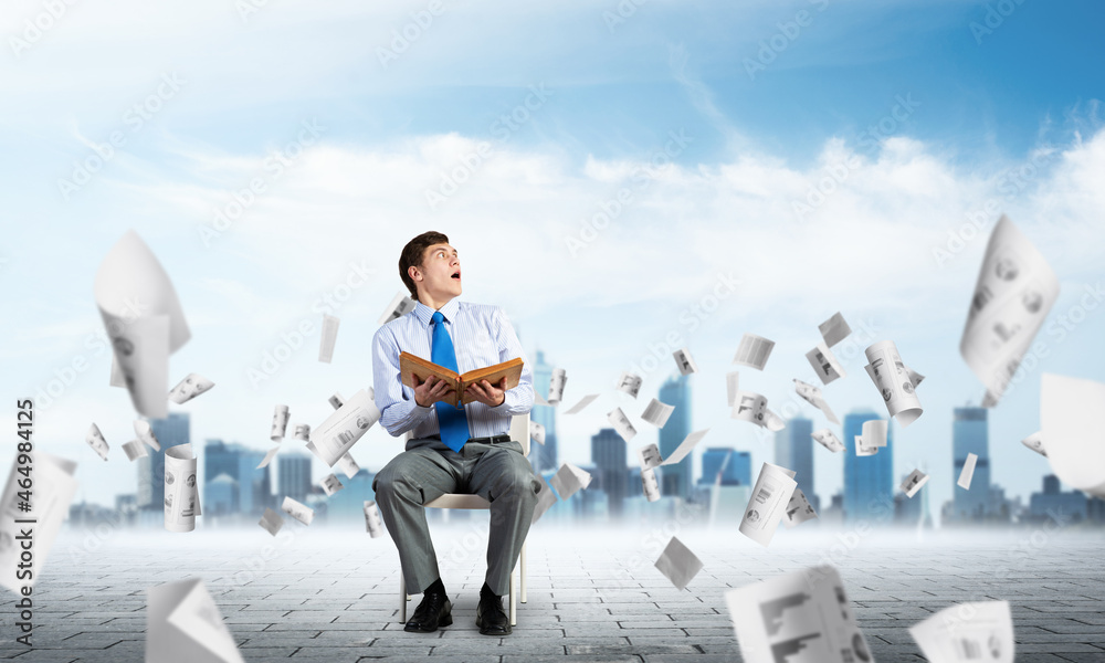 young businessman with book