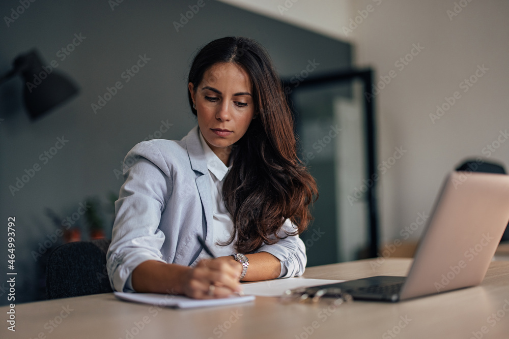 Adult woman, planing for the future of her company.