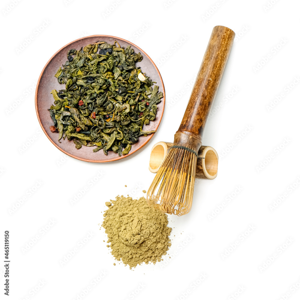 Hojicha green tea and chasen on white background